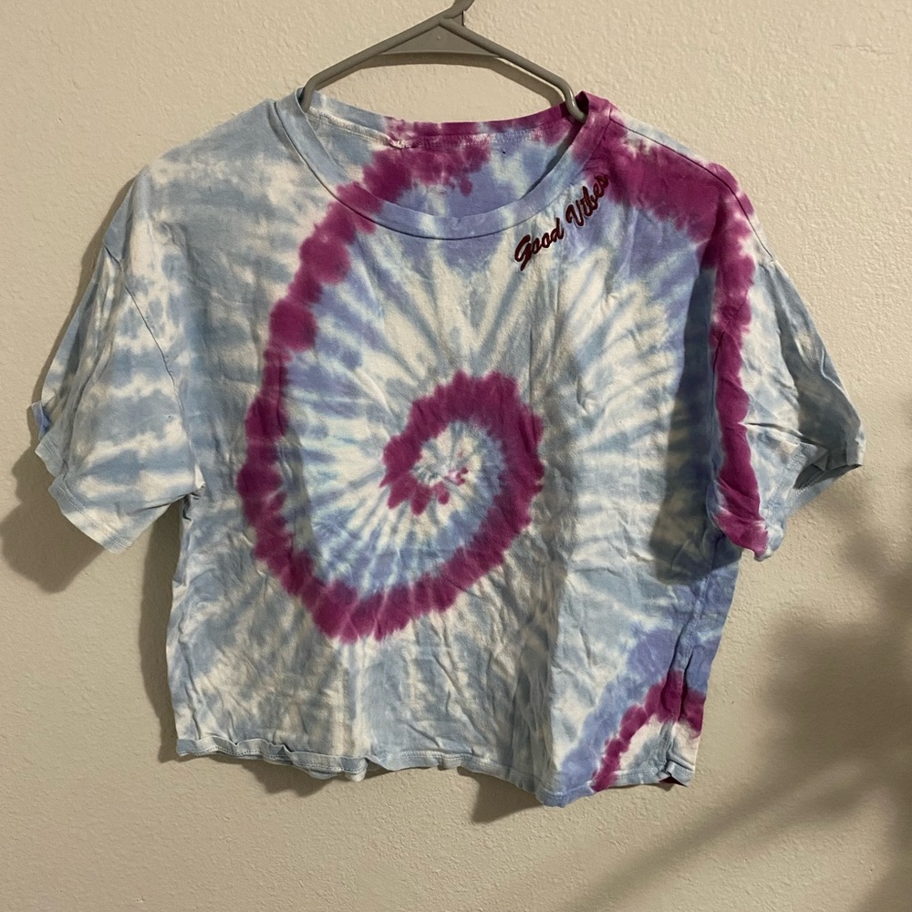 It’s a cropped tie dye shirt